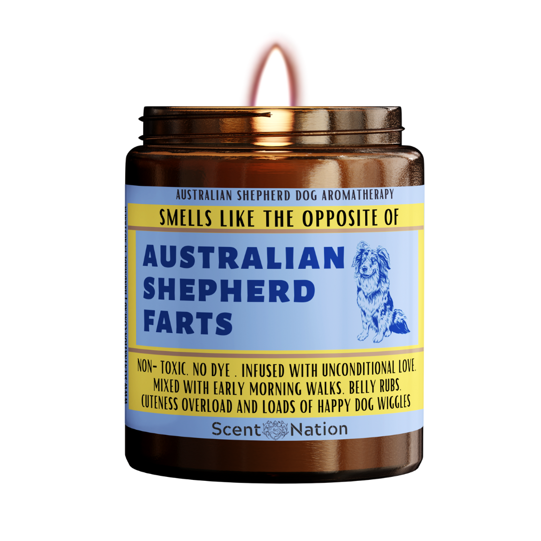 An Australian Shepherd puppy sitting on a candle labeled "Smells like the opposite of an Australian Shepherd fart". The candle is made in Australia and is a great gift for Australian Shepherd lovers, new Australian Shepherd owners, or anyone who appreciates a dog candle that doubles as a fart extinguisher. This funny and unique dog gift is perfect for gag gifts, dog lovers, Australian Shepherd owners, dog trainers, and dog groomers. It is also a great birthday gift for your furry friend.